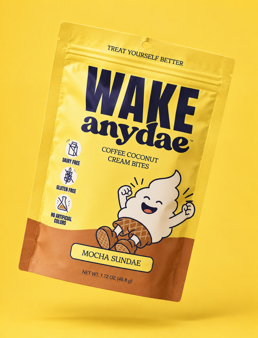 A yellow stand-up pouch of Wake Anydae Coffee Coconut Cream Bites in Mocha Sundaie flavor, shown on a solid yellow background.